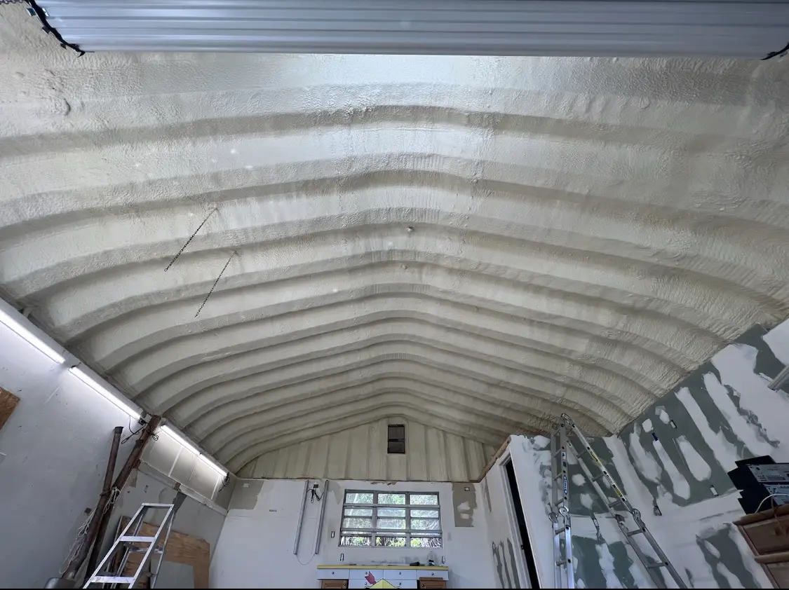 Spray polyurethane foam applied to the underside of a metal roof deck in South Burlington